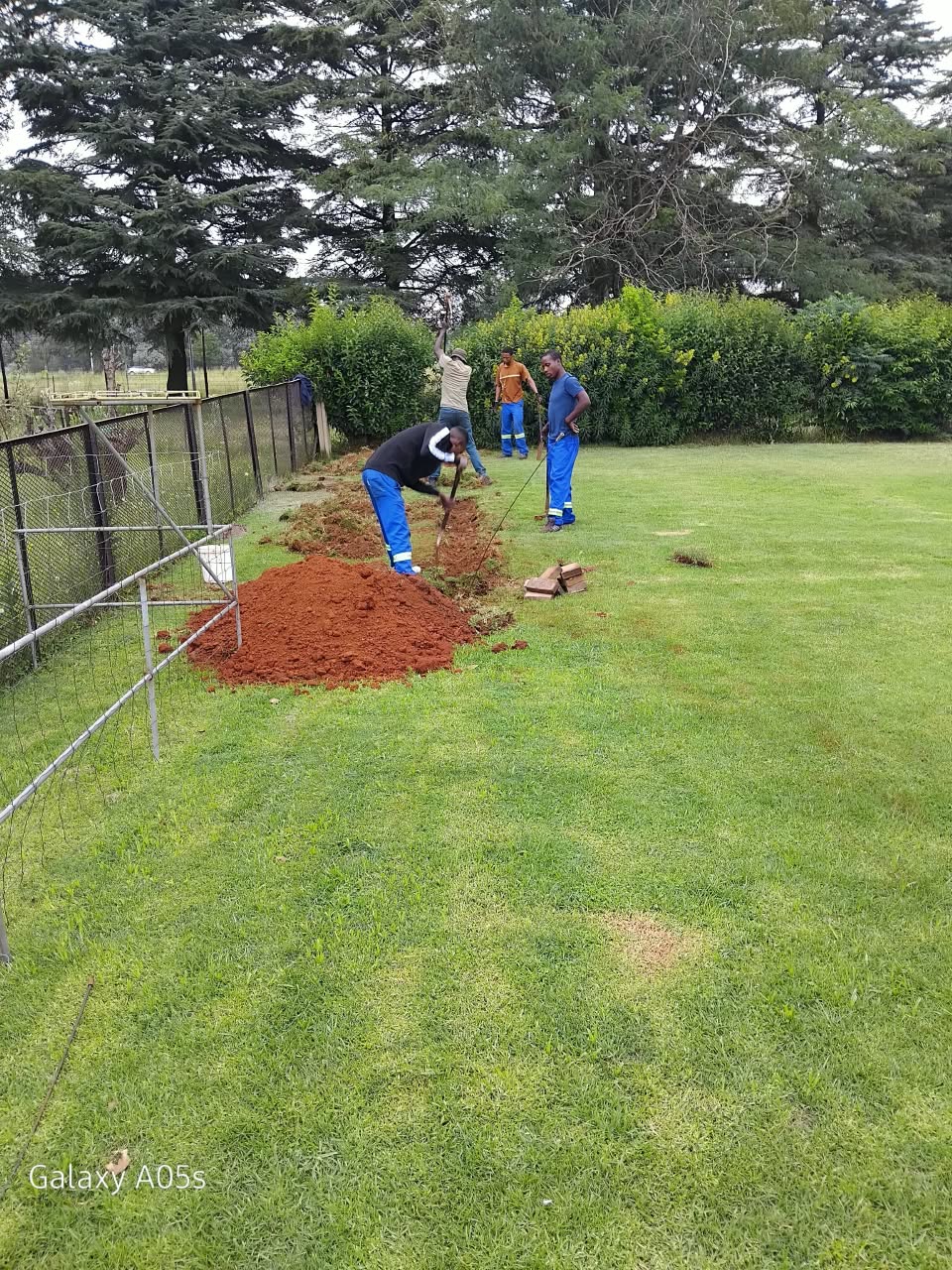 Trench excavated for underground water and sewer pipework on site